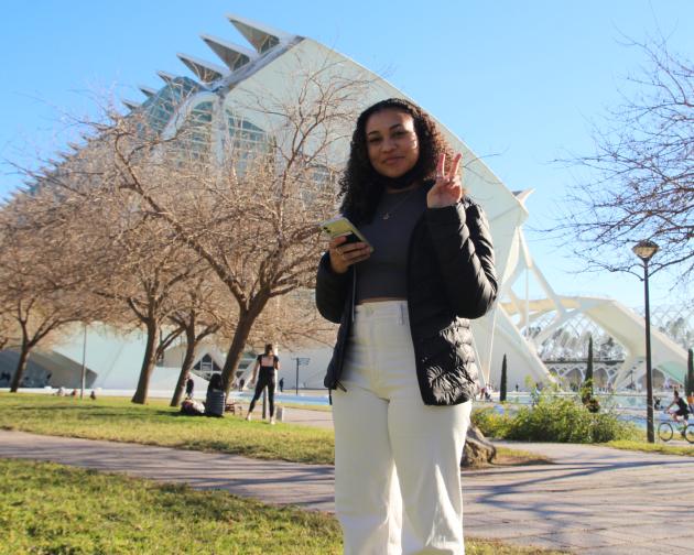 a student standing in a park in Valencia, Spain