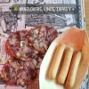 Jamon slices and breadstick with a location pin "Winelovers, Vino, Tapas Y +"
