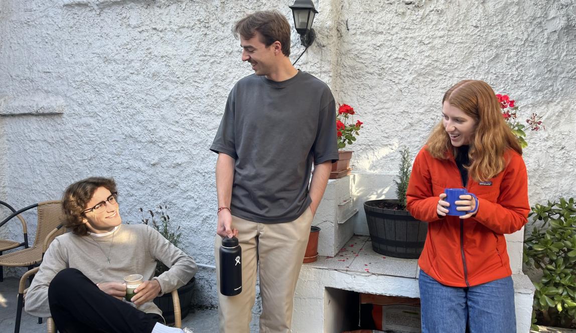 students in IES Abroad Santiago Center courtyard having a conversation