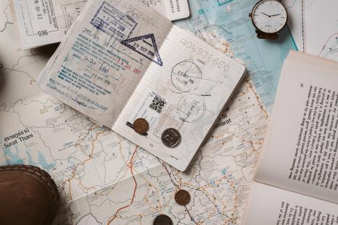 passport stamps and stickers inside of passport books