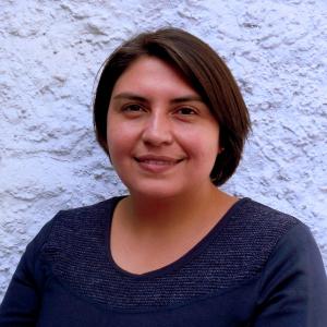 Headshot of Paola Riquelme.